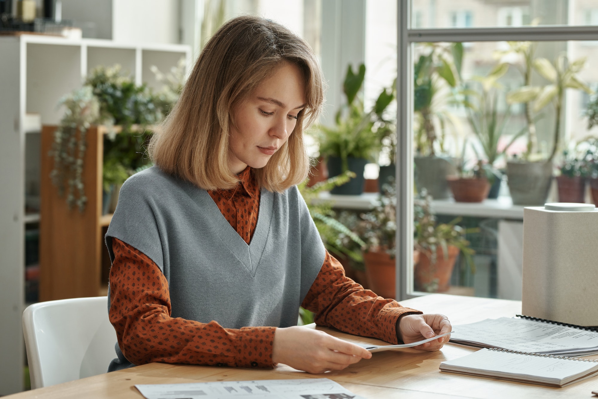 Woman working with documents at office